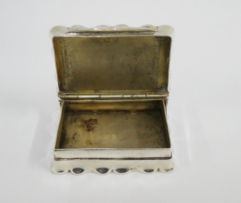 Edwardian silver snuff box, the wavy edged hinged top with an engraved scroll pattern and vacant - Image 2 of 3