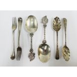 Pair of Continental silver spoons with sail boat finials, a pair of London silver berry spoons and a