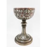 A heavy 19th century Persian cast copper goblet, with silver inlaid decoration of trailing leaves,