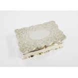 Edwardian silver snuff box, the wavy edged hinged top with an engraved scroll pattern and vacant