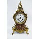 French Boulle mantle clock, the circular dial with Roman hour numerals and Arabic minutes, 32cm high