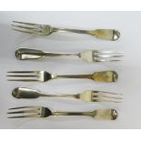A matched set of Fiddle pattern three prong dessert forks to include three Newcastle and two London,