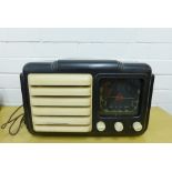 A vintage Bakelite Raymond Electric radio, 42 x 25 x 20cm