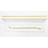 9ct gold gemset tennis style bracelet, boxed