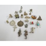 Twenty various silver charms (20)