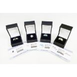 Four contemporary silver gemset dress rings, boxed (4)