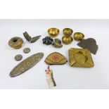 Mixed metalware items to include a bronze hand and part of a Buddha together with a lotus flower,