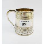 George IV silver mug, makers mark TD, London 1825, of slightly tapering form with threaded bands and