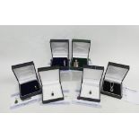 Six modern 9ct gold and gemset pendants (6)