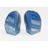 A pair of blue hardstone bookends, 15cm high (2)