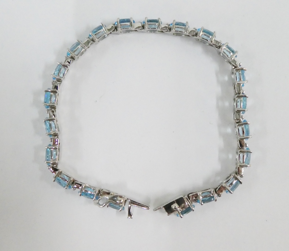 Silver and pale blue gemstone tennis style bracelet, boxed - Image 2 of 3