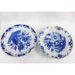 Two Delft blue and white tin glazed chargers, 35cm diameter (2) (a/f)