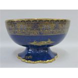 W & R Carlton Ware blue glazed pedestal bowl with gilt edged rim and Pagoda pattern, with blue