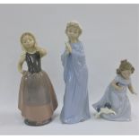 Three Nao female figures, tallest 27cm (3)