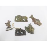 Five south East Asian bronze plaques, possibly Tibetan, largest 9cm (5)