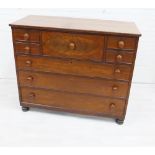 19th century mahogany chest, the rectangular top over one deep drawer flanked by four small over