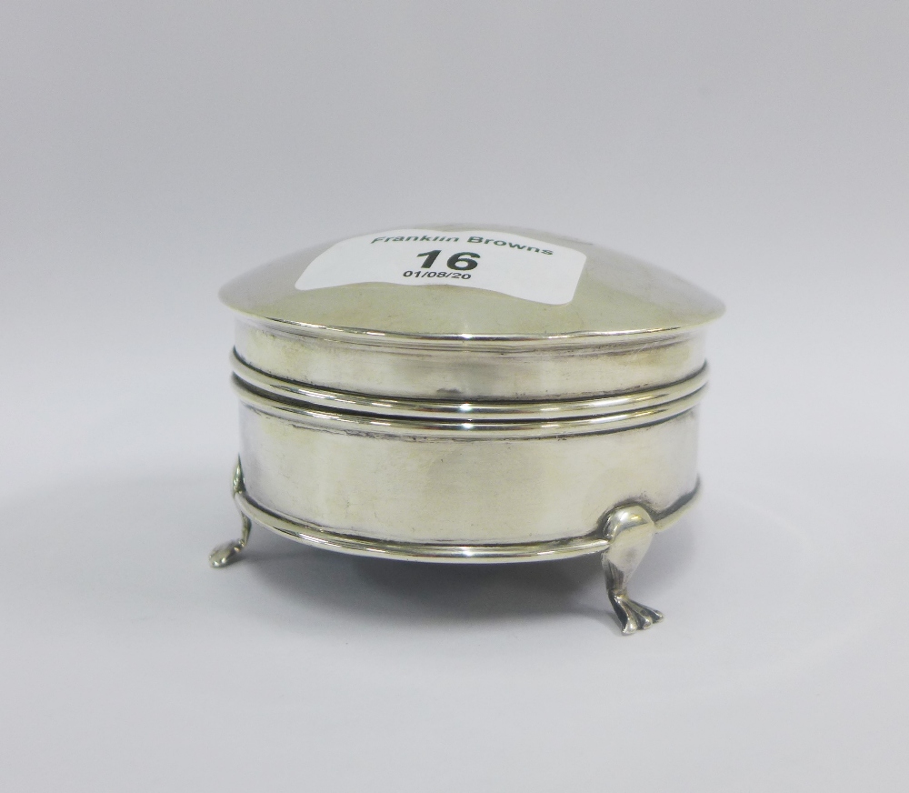 Early 20th century silver trinket box, with hinged lid and three hoof feet, 8cm diameter