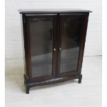 Stag bookcase with a pair of glazed doors, 101 x 82cm