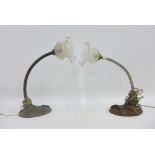 Pair of early 20th century table lamp bases with glass shades with way rims, (2)