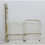 Victorian white painted metal bed with side rails.
