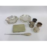 A mixed lot to include a pair of Chester silver salts, continental silver trinket box, silver