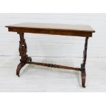 Mahogany table, the rectangular top on pierced side supports united by a turned stretcher, on