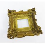 A ornate giltwood frame, size overall 22 x 24cm