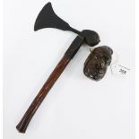 Wooden axe and novelty carved wood head, 24cm long