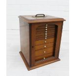 Small mahogany collector's cabinet with eleven graduating drawers, 32 x 25cm