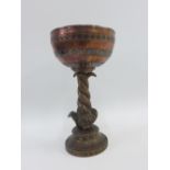 Heavy cast Persian copper and white metal inlaid goblet on a serpent stem and circular footrim, 20cm
