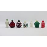 A collection of seven snuff bottles to include two pottery and five glass examples (7)