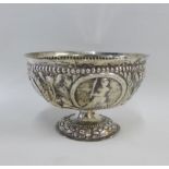 Continental silver pedestal bowl with repousee figural panels and flowerhead pattern, 13 x 8cm