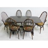 Ercol dark elm dining table and set of six chairs (7)