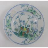 Chinese famille verte saucer dish with bamboo pattern, seal mark to the base, 21cm diameter