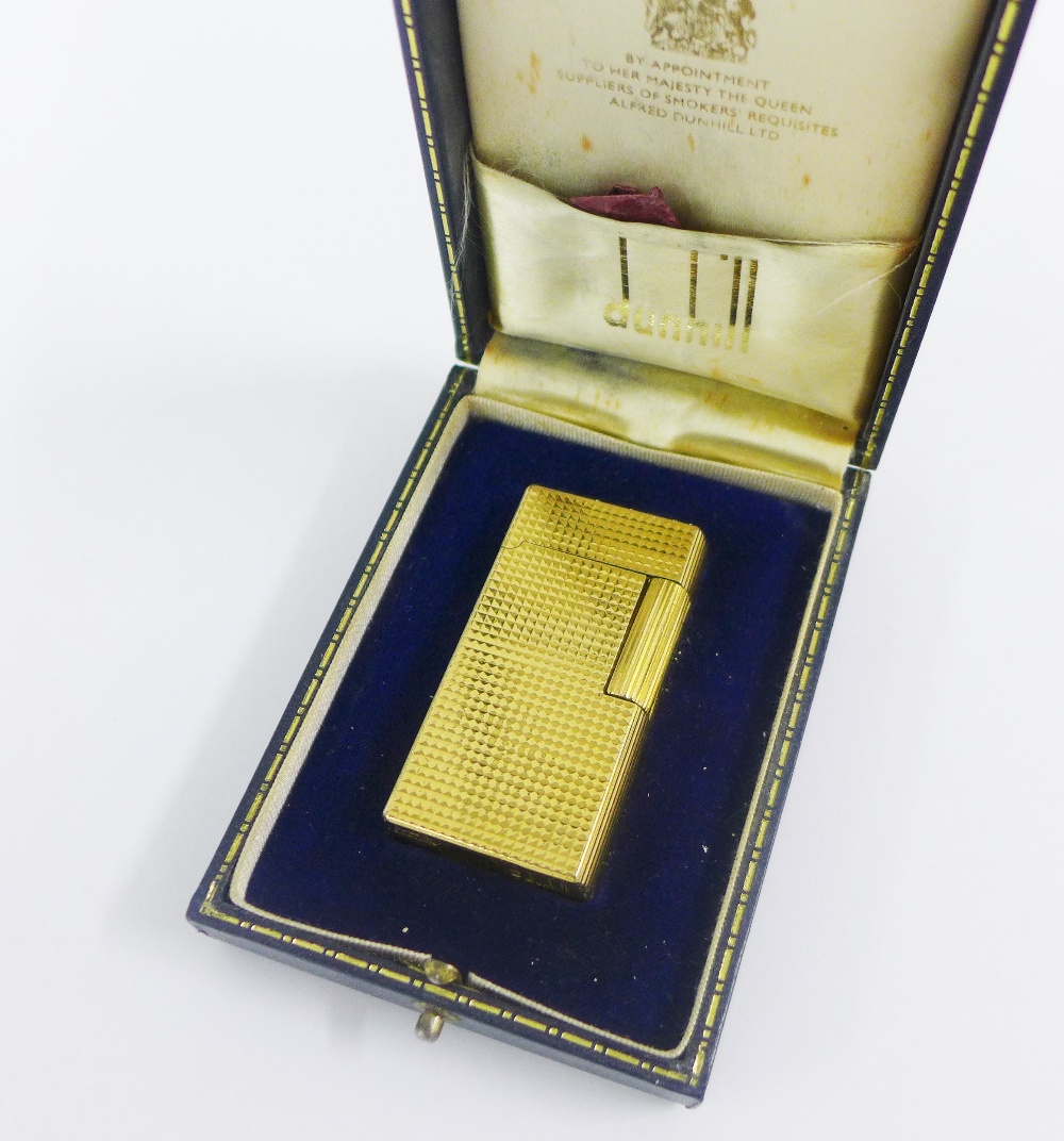Gold plated Dunhill lighter in presentation box.