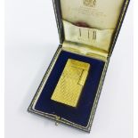 Gold plated Dunhill lighter in presentation box.