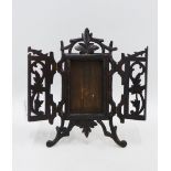 Black Forest style carved wooden frame with an easel back, 22cm high