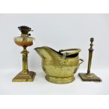 Early 20th century brass oil lamp base with Reg No 209074 together with a brass table lamp base