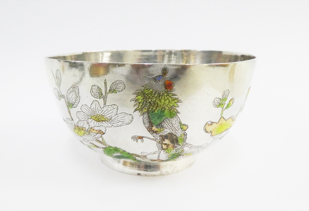 Chinese silver and enamel bowl with bird and flowers pattern, on a plain circular foot rim, 10cm