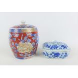 Japanese porcelain tobacco jar and cover with chrysanthemum pattern together with a blue and white