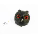 Bronze patinated metal desk bell in the form of an owls head with faux glass eyes