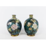 Pair of miniature cloisonne baluster vases, the dark green ground decorated with chrysanthemums, 9.