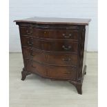 Mahogany serpentine chest with a pull out slide over four graduated long drawers, on bracket feet,