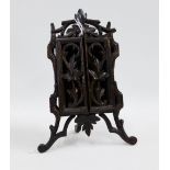 Black Forest style carved wooden frame with an easel back, 22cm high