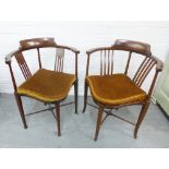 Two Edwardian mahogany inlaid corner chairs with loose squab cushions, 77 x 58cm (2)