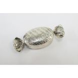 Novelty silver pill box in the form of a sweetie, stamped 925, 6cm long