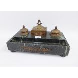 Green marbled hard stone desk inkstand with two bronze patinated inkwells and a rectangular box,