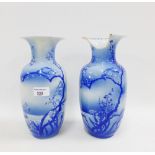 Pair of Japanese blue and white baluster vases, with blossom and bird pattern, one losses to the