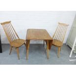 Ercol blonde elm dining set comprising a pair of chairs and a table, (3)