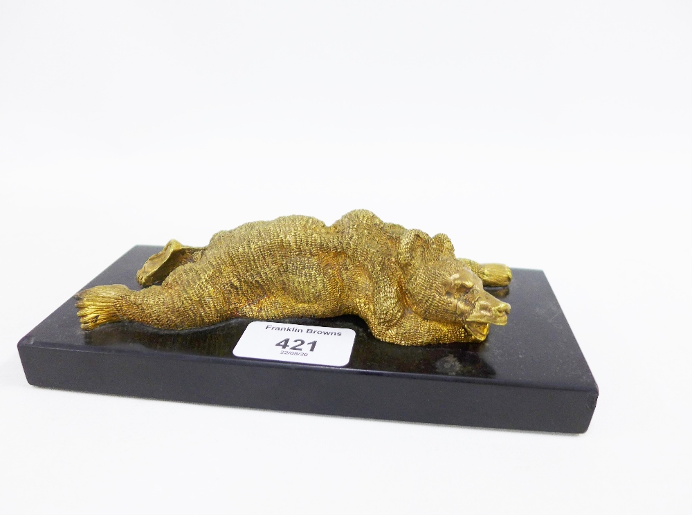 Russian gilt bronze Bear desk paperweight, after Nikolai Lieberich, modelled lying recumbent on a